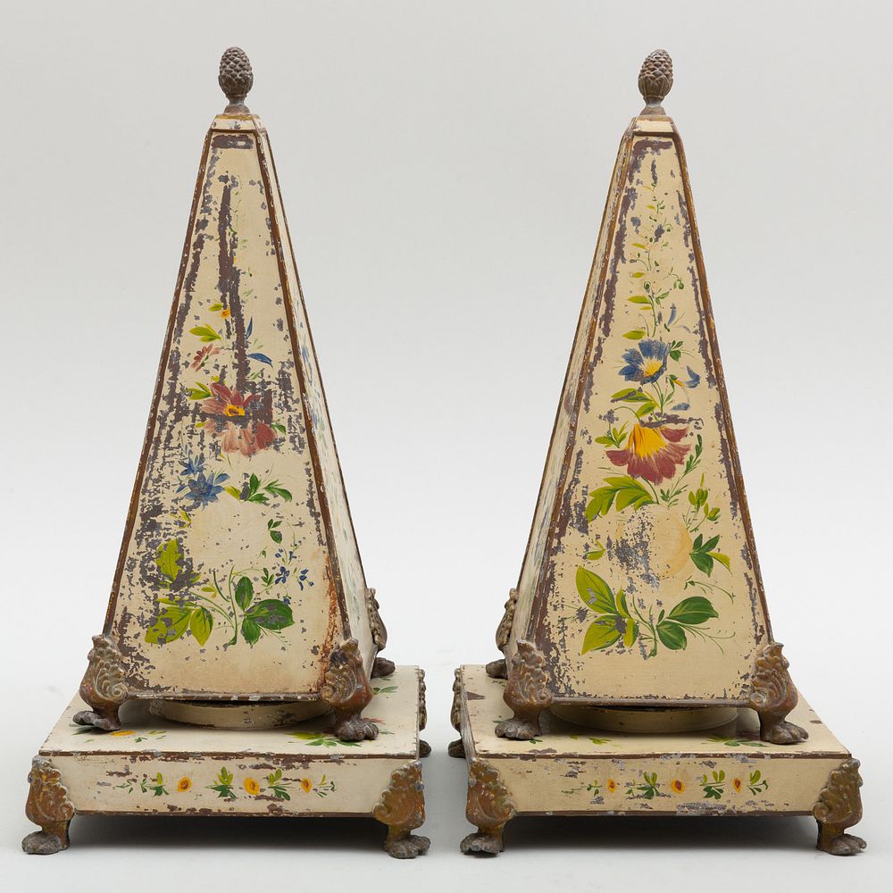 Appraisal: Pair of Floral Cream Painted T le Obelisks In two