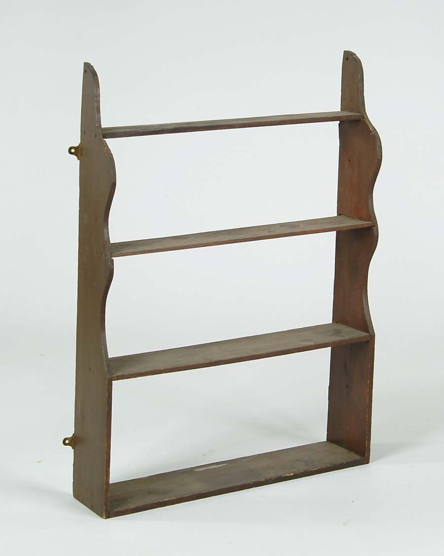 Appraisal: ANTIQUE SHAPED WALL SHELF Four tier with shaped sides square