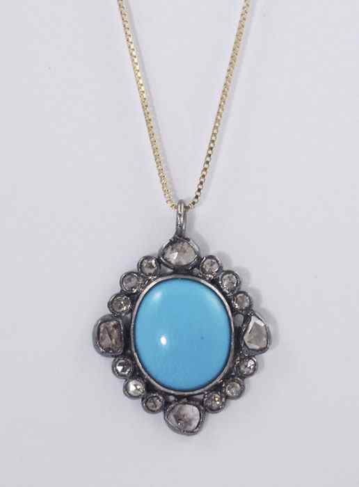 Appraisal: NATURAL SLEEPING BEAUTY TURQUOISE DIAMOND NECKLACE Sterling pendant contains one