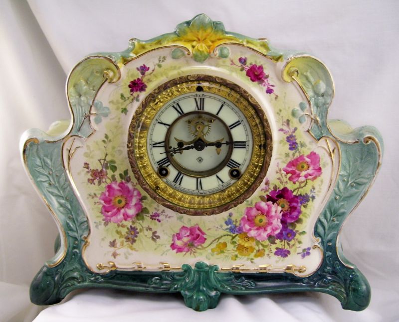 Appraisal: Royal Bonn Porcelain Clock Ansonia clock works inside of a