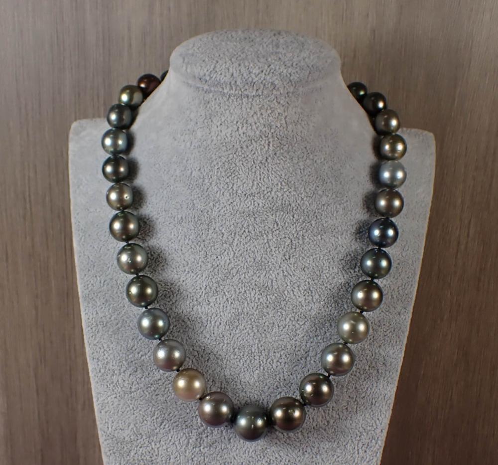 Appraisal: TAHITIAN PEARL AND EIGHTEEN KARAT GOLD NECKLACE - hand-knotted strand