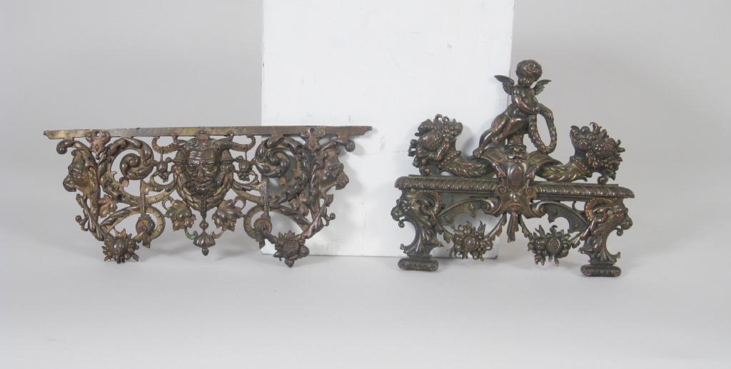 Appraisal: Two large bronze Furniture Mounts with mask cherub and cornucopia