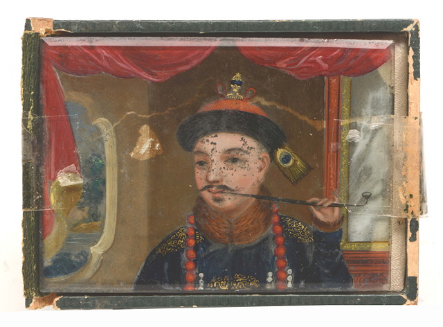 Appraisal: A CHINESE MINIATURE of the head and shoulders of a