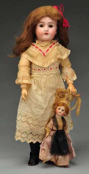 Appraisal: Lot of Bisque Dolls Description Both with bisque socket heads