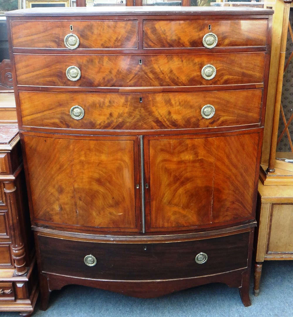 Appraisal: An early th century mahogany bowfront linen press of two