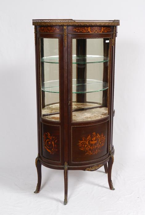 Appraisal: R J HORNER MARQUETRY INLAID SERPENTINE VITRINE Pierced brass gallery