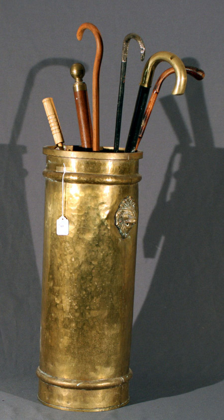 Appraisal: Hammered Brass Umbrella Stand with Walking Sticks th Century Height