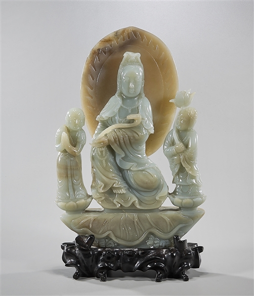 Appraisal: Chinese carved jade seated Buddha with mandorla and attendants with