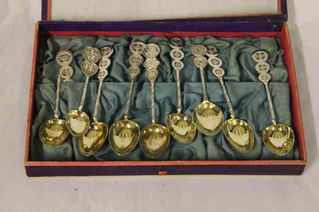 Appraisal: A COLLECTION OF NINE CHINESE SILVER SPOONS the handles with