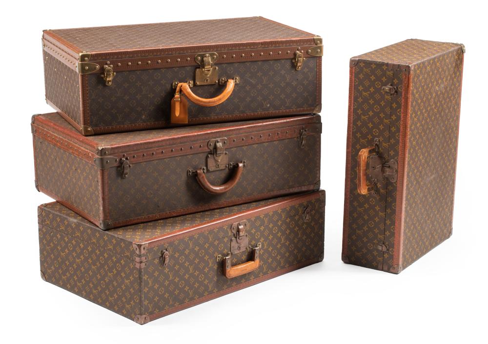 Appraisal: Four Vintage Louis Vuitton Suitcases three largest in x in