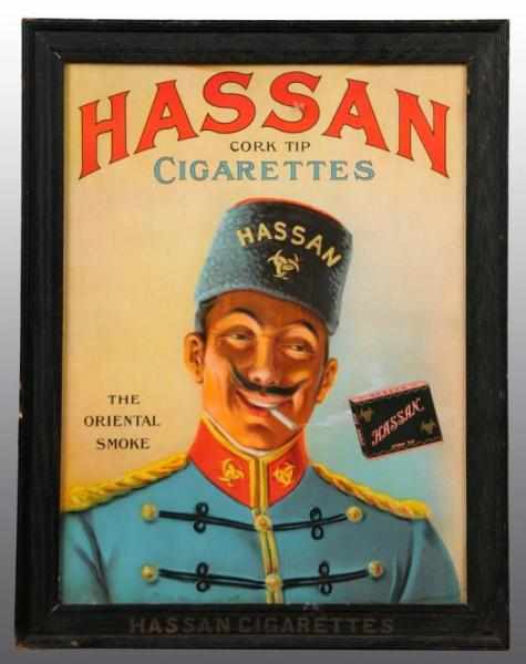 Appraisal: Cardboard Hassan Cigarettes Sign in Wooden Frame Description Nice image