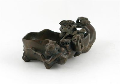 Appraisal: A Chinese bronze brushwasher cast with leafy pine branches one