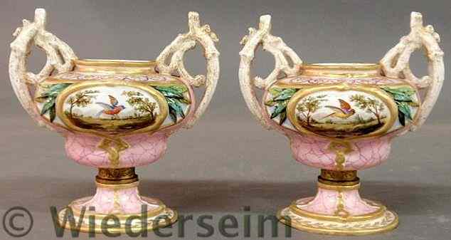 Appraisal: Pair of Sevres vases each with double tree branch-form handles