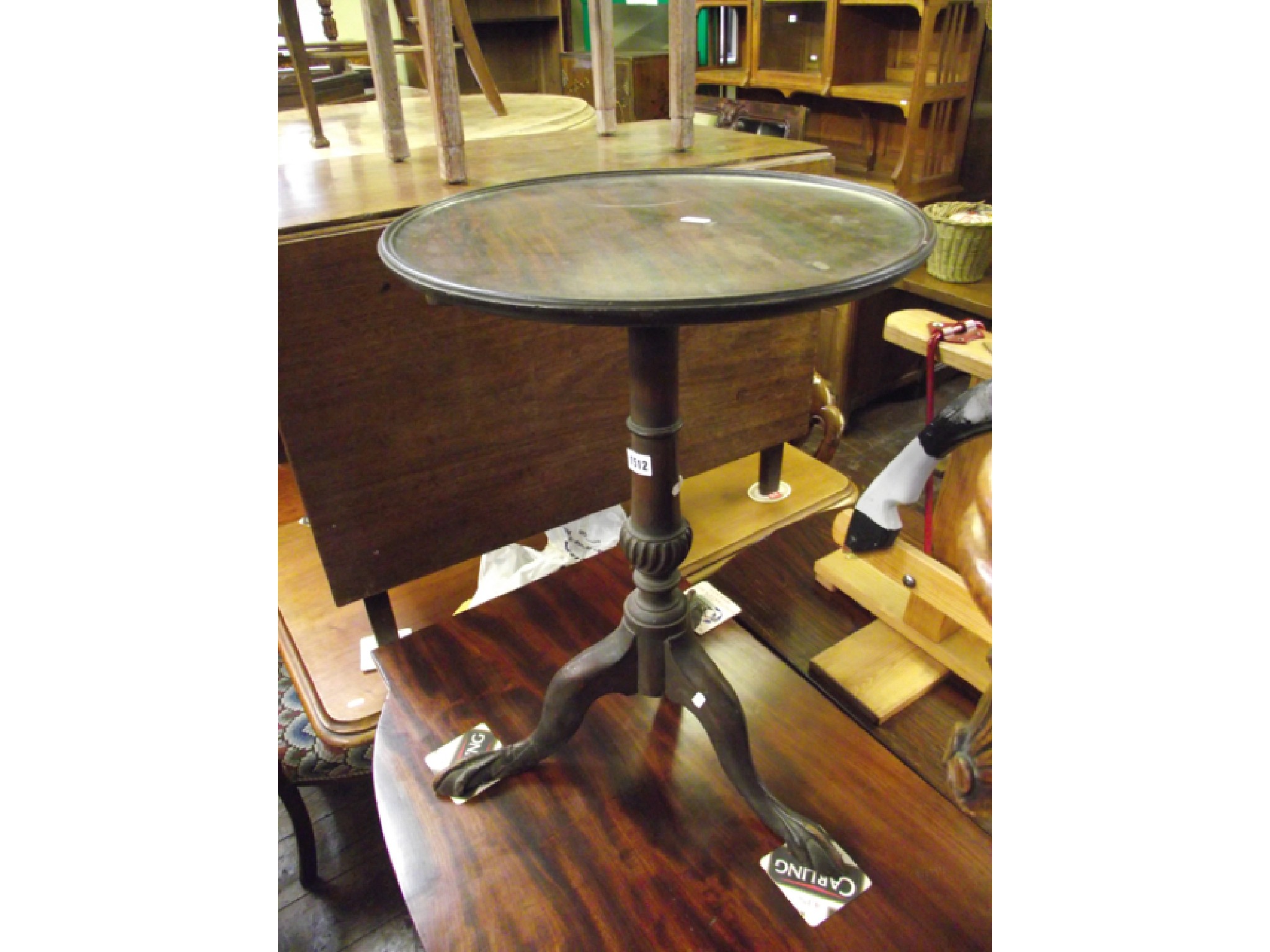 Appraisal: A Georgian mahogany occasional table the circular tray top raised