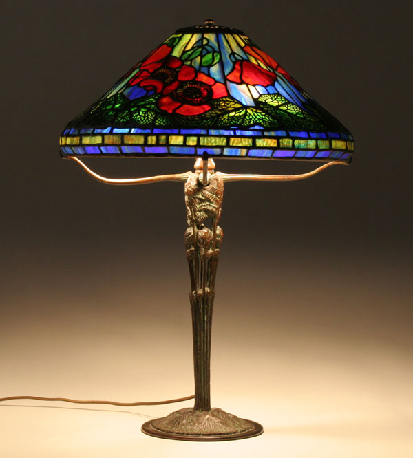 Appraisal: Leaded glass and bronze table lamp in the poppy pattern