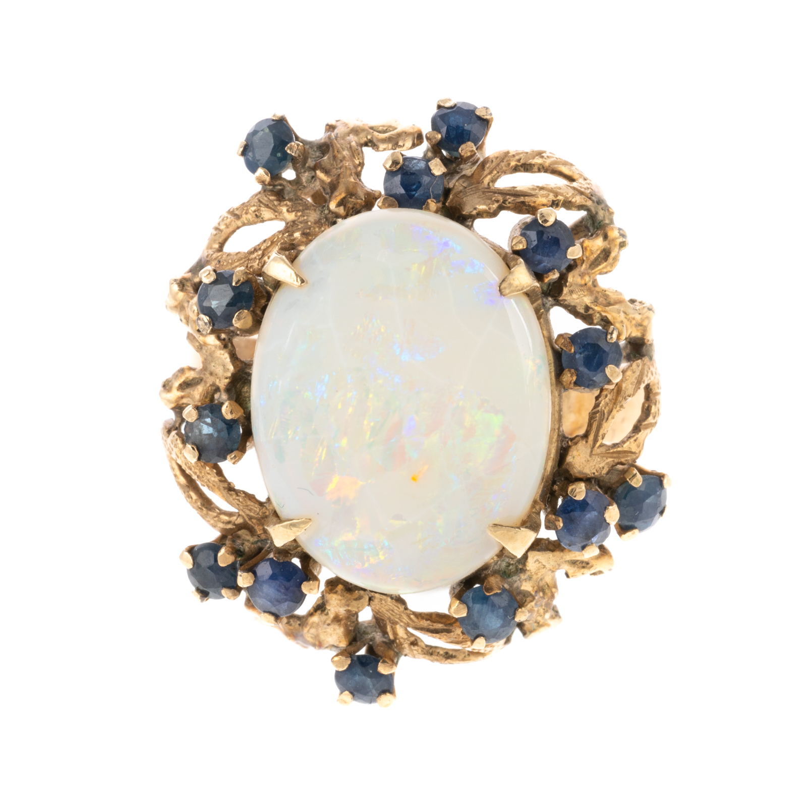 Appraisal: A TEXTURED OPAL SAPPHIRE RING IN K K yellow gold