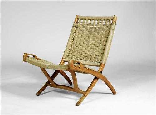 Appraisal: HANS WEGNER J d'apr s - CHAISE PLIABLE mod le