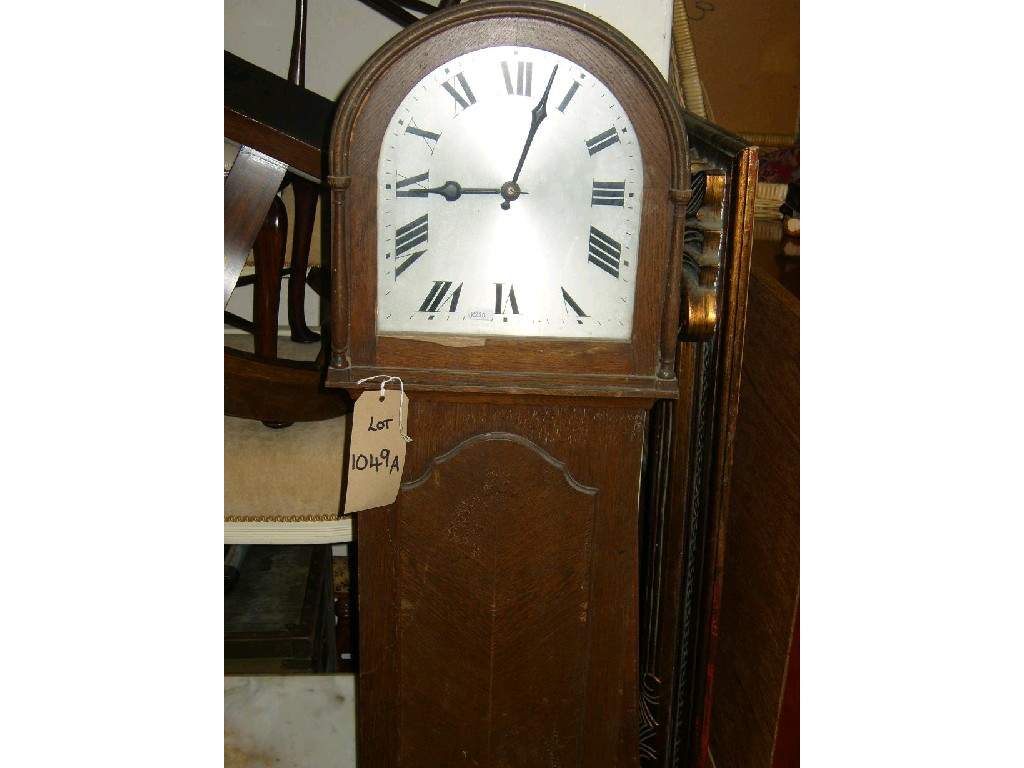 Appraisal: An early th century oak cased grandmother clock with arched