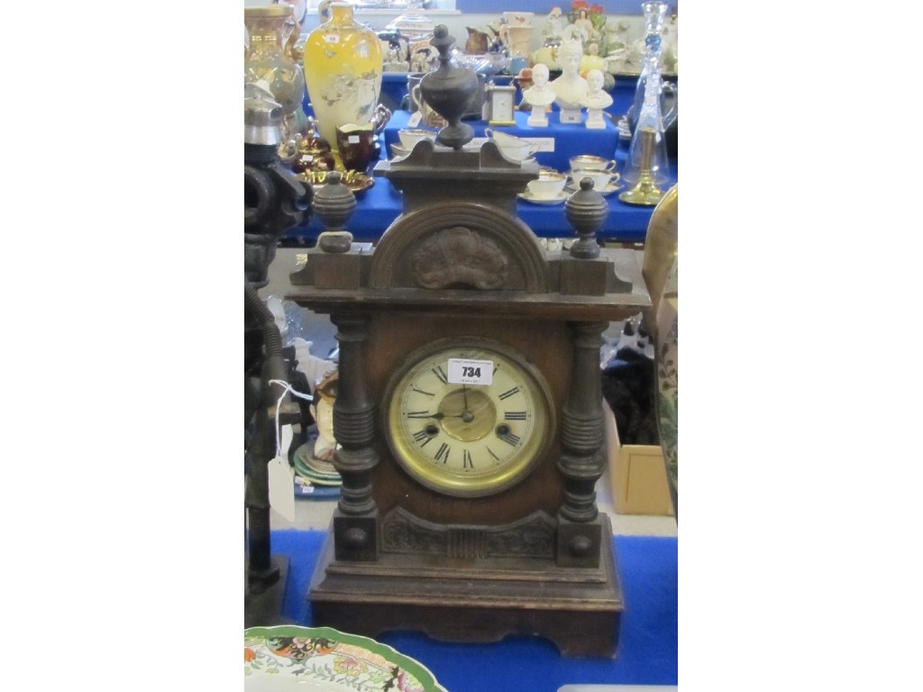 Appraisal: Carved wooden mantle clock