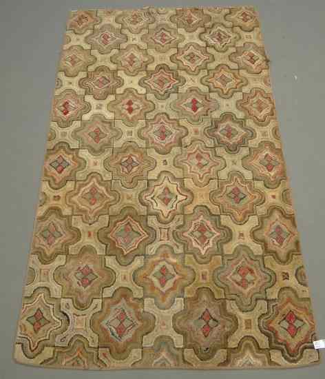 Appraisal: th c geometric hooked rug Imperfections '' x ' ''