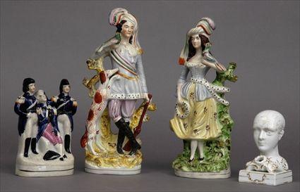 Appraisal: ASSEMBLED PAIR OF STAFFORDSHIRE FIGURES A FIGURE GROUP AND A