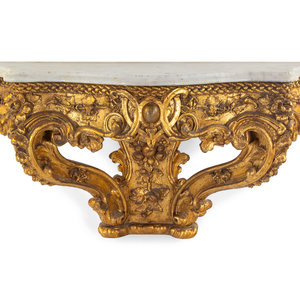 Appraisal: An Italian Rococo Carved Giltwood Marble Top Console d'Appliqu th