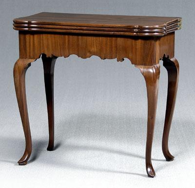 Appraisal: Queen Anne triple-top games table mahogany with scrolled and veneered