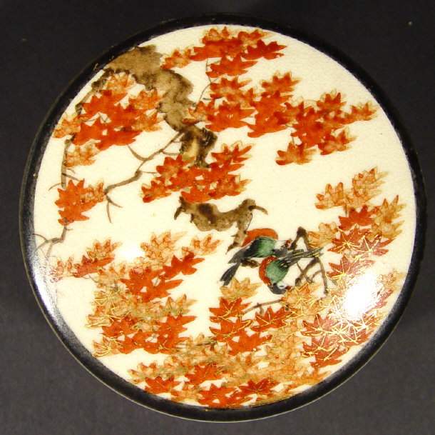 Appraisal: Japanese Satsuma pottery box and cover the exterior hand painted