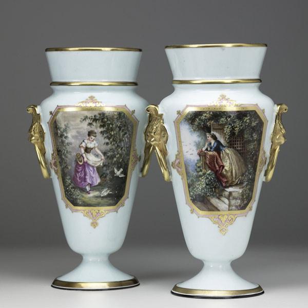 Appraisal: French porcelain urns late th C Hand-painted reserves with gold