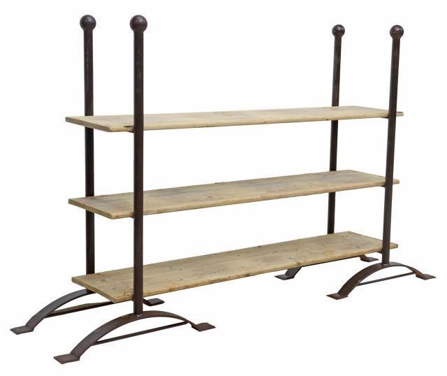 Appraisal: Low rustic baker's rack shelf st c iron frame with