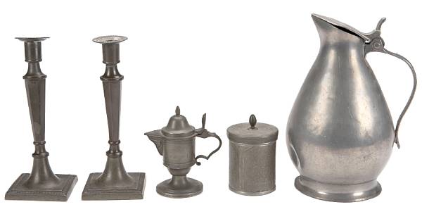 Appraisal: A collection of pewter table articles comprising two large pitchers