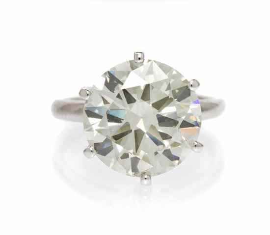 Appraisal: A White Gold and Diamond Ring containing one round brilliant