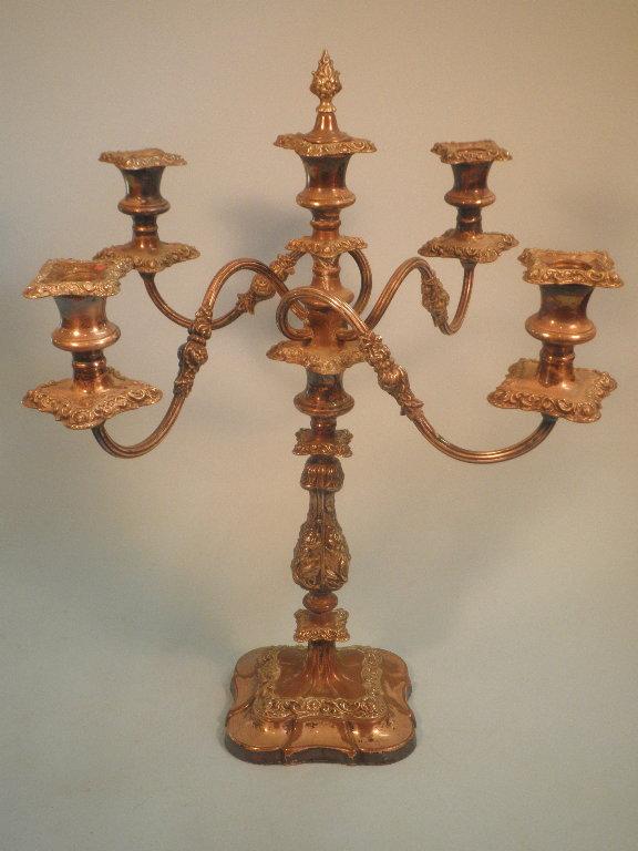 Appraisal: A thC silver plated five branch candelabrum on a flower