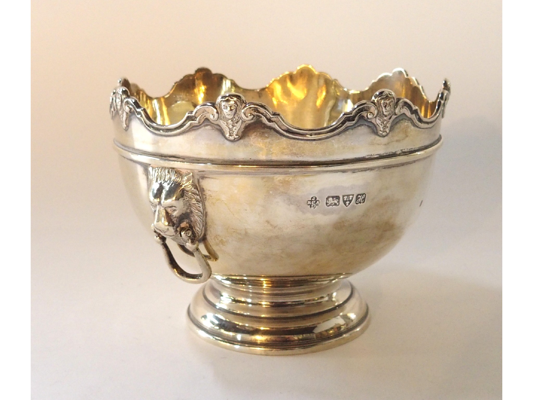 Appraisal: A silver rosebowl with lion's mask handles Chester z