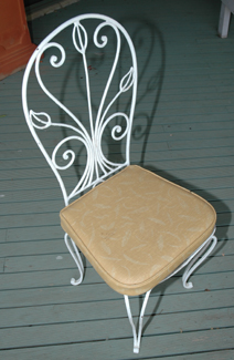 Appraisal: SIX WHITE PAINTED WROUGHT IRON GARDEN SEATS Comprising four chairs