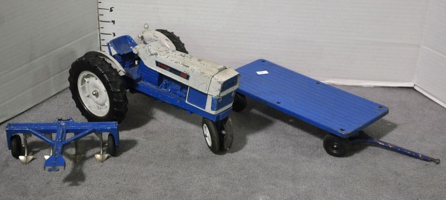 Appraisal: Bx Dicast Ford TractorTrailer and plow Tractor is long