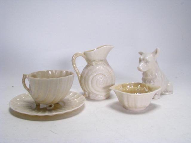 Appraisal: Four pieces Belleek Irish porcelain including shell creamer shell cup