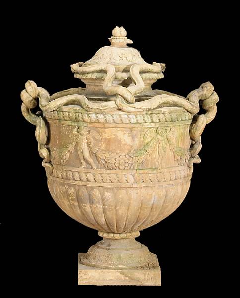 Appraisal: A Continental Neoclassical style tinted terracotta covered urn th century