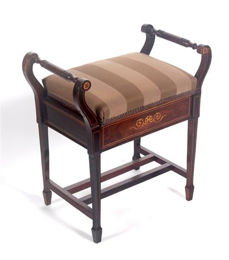 Appraisal: An Edwardian inlaid piano stool the square cushioned seat flanked