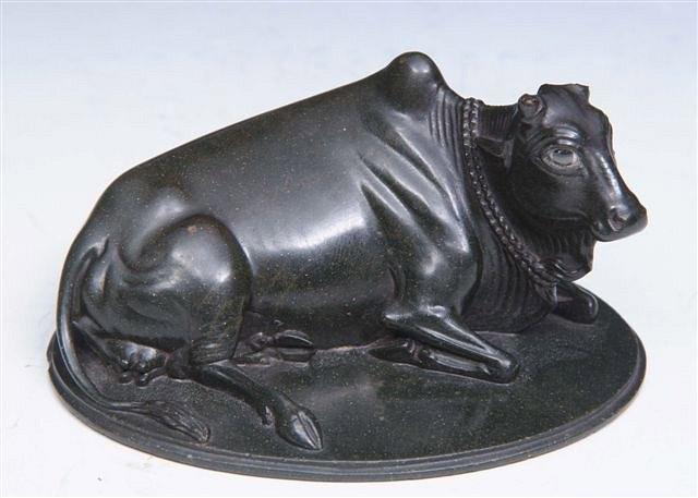 Appraisal: AN INDIAN STEATITE CARVED MODEL of a Nandi bull seated