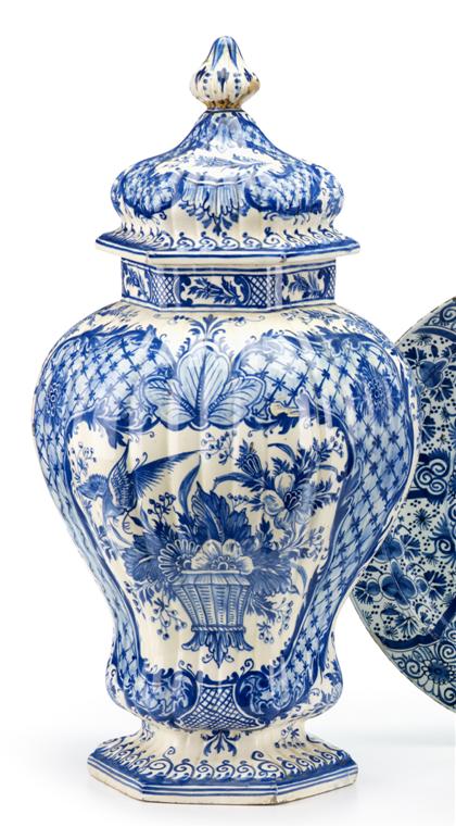 Appraisal: Large Delft blue and white covered urn th century Of