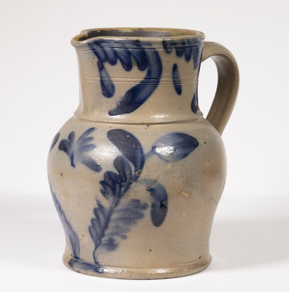 Appraisal: DECORATED SALT GLAZED STONEWARE PITCHER Late th c Jug probably