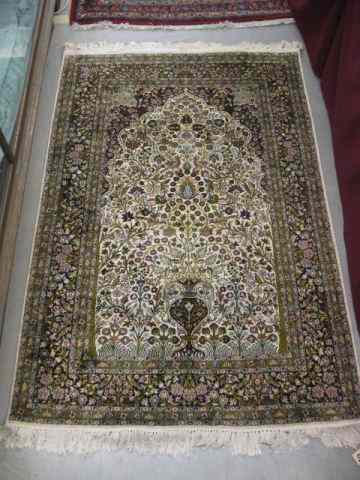 Appraisal: Persian Silk Handmade Rug elaborate flowering vine designs in Tabriz