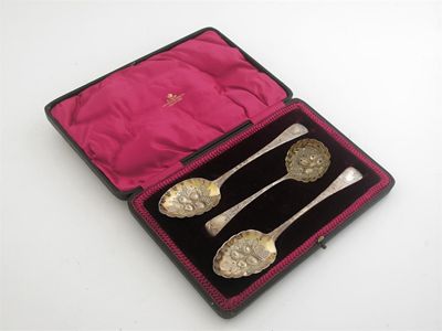 Appraisal: A late Victorian cased set of three 'berry' spoons a