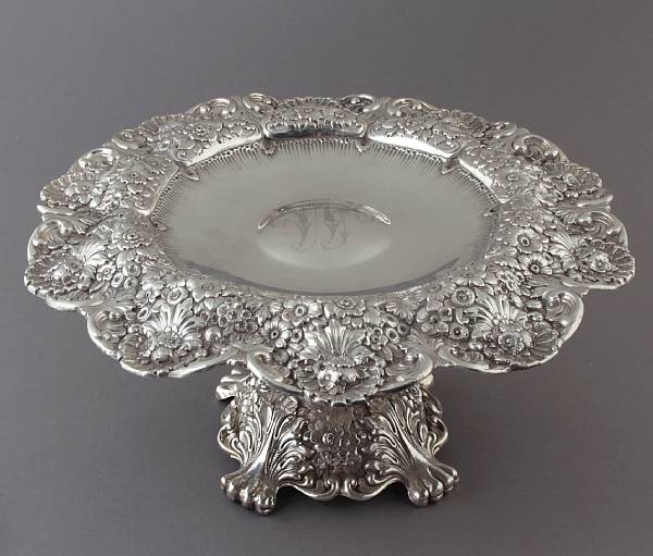 Appraisal: A sterling tazza with repousse ornament Monogrammed to center height