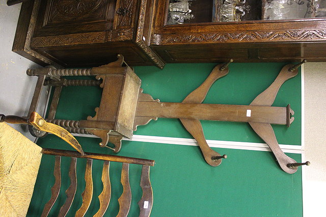 Appraisal: AN OAK HALL STAND with coat rack over a glove