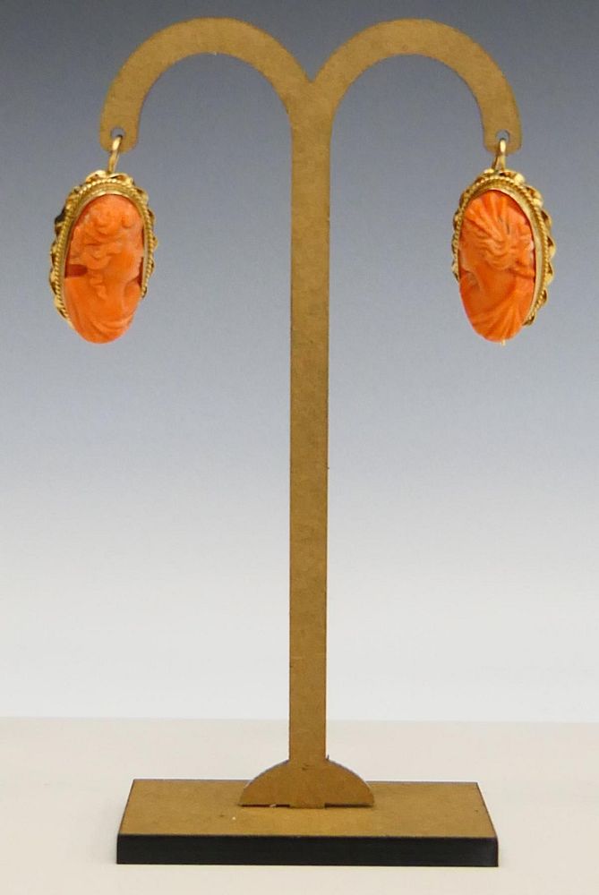 Appraisal: CHINESE PAIR OF ANGEL SKIN CORAL KT EARRINGS Each earring