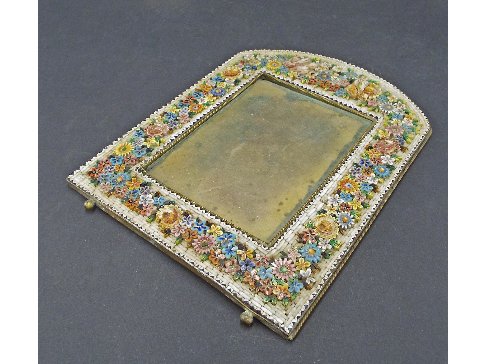 Appraisal: Italian micro mosaic arched picture frame decorated with floral sprays