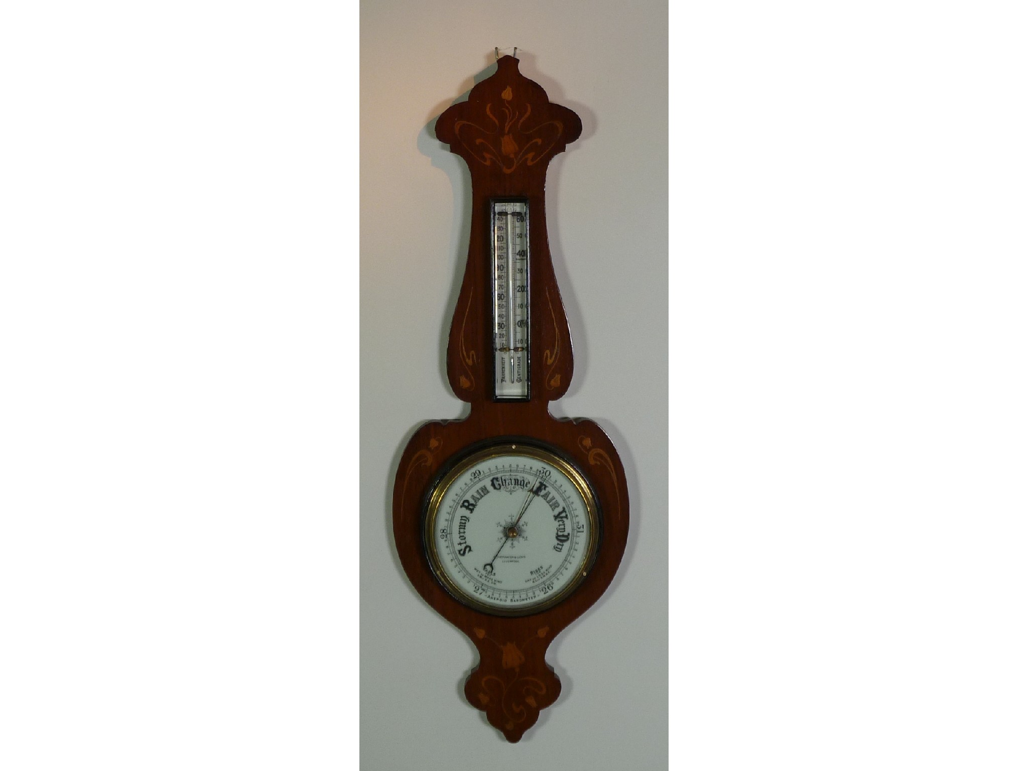 Appraisal: ART NOUVEAU MARQUETRY INLAID MAHOGANY ANEROID BAROMETER signed Schierwater and