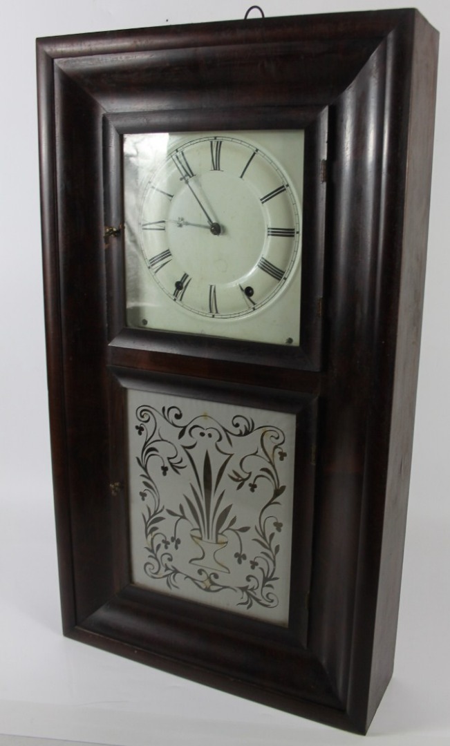 Appraisal: A thC American shelf clock with flamed mahogany ogee case